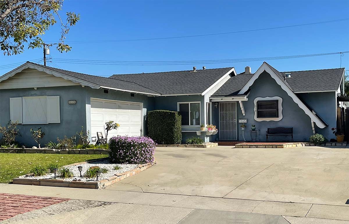 Front exterior of 514 N Balton Ave, a one-story 4 bedroom 2 bathroom single family home in San Dimas, California, with lawn, flowering ground cover and a wide concrete driveway